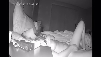 A Reserved Woman Pleasures Herself In Bed, Captured By A Hidden Camera